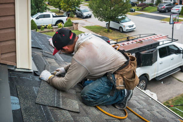 Professional Emergency Roof Repair technician working in New Paris, PA